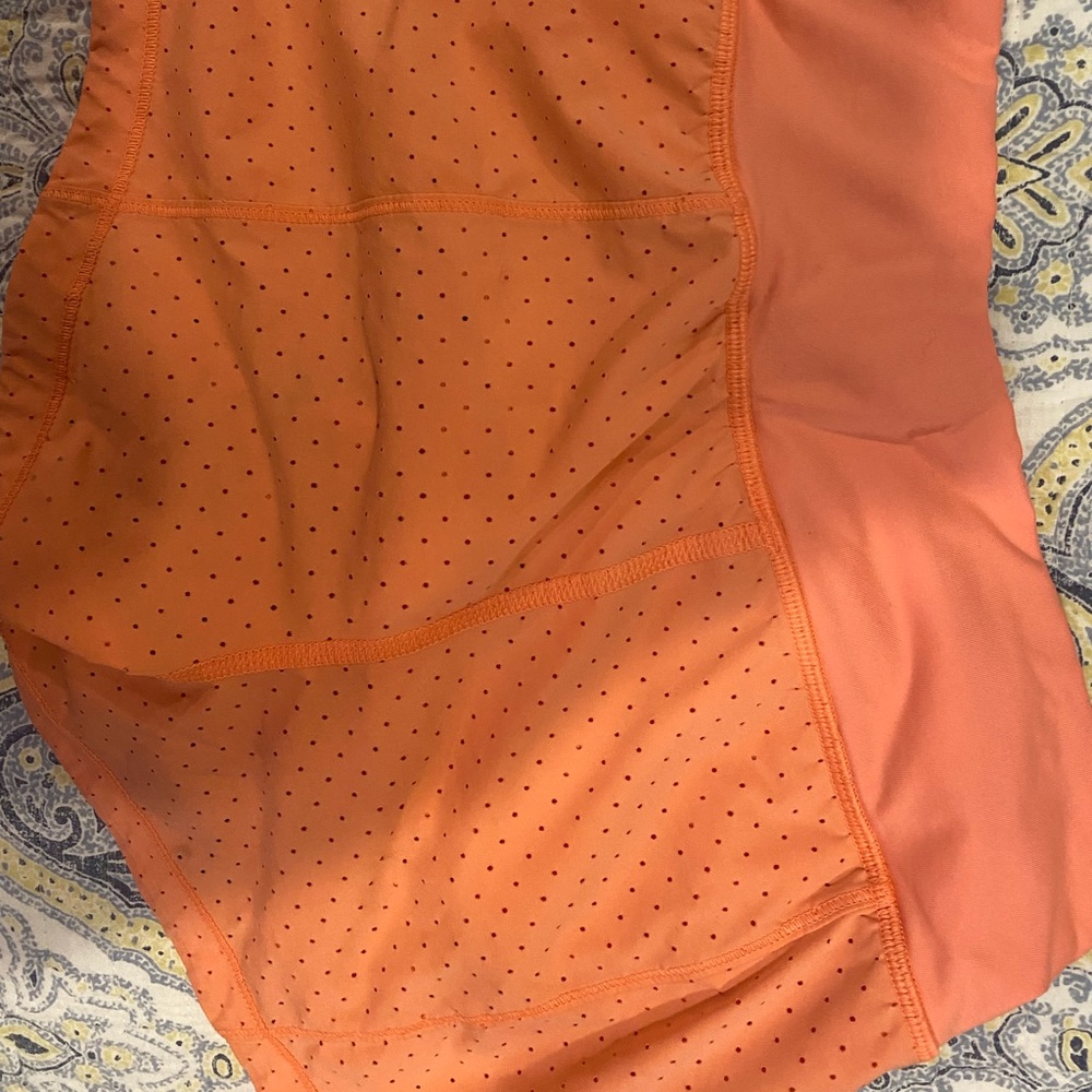 Lululemon running shorts. Size 2! Navy and Coral. 2 pairs for the prize of one!